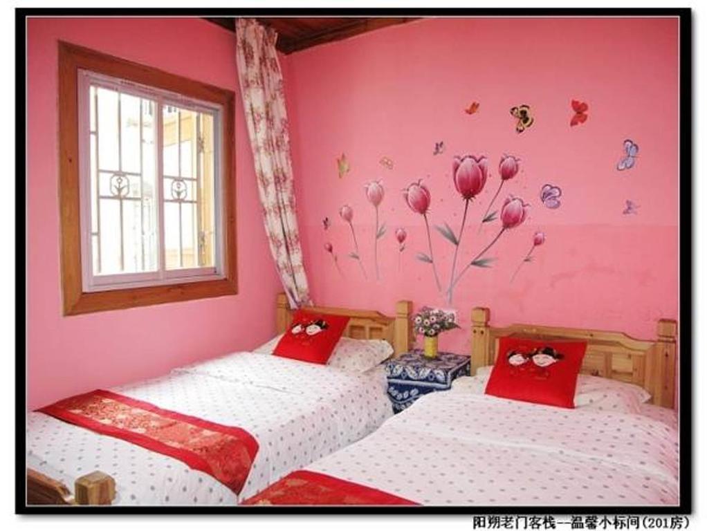 Hotel 老门客栈 à Yangshuo Extérieur photo